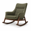 Sillón mecedora de tela verde con marco de madera