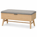 Banco de madera de roble con asiento de tela gris